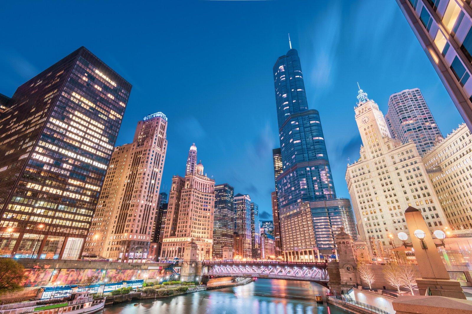 Chicago, Illinois, USA cityscape on the river at twilight.